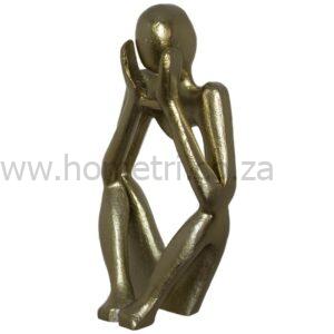 The Pensive Gold Figure